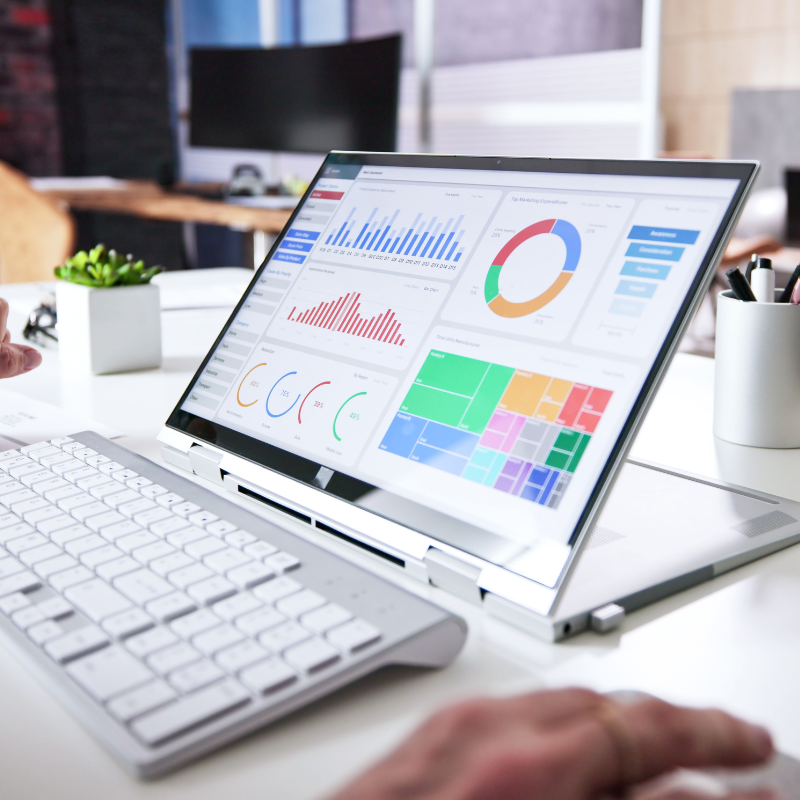 Laptop displaying analytics dashboards with charts, graphs, and performance metrics, showing MBM360’s optimized analytics for data-driven growth.