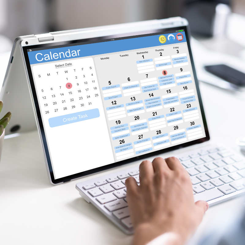 Mental health therapist using a digital calendar on a tablet to manage appointments and tasks through a secure client portal.